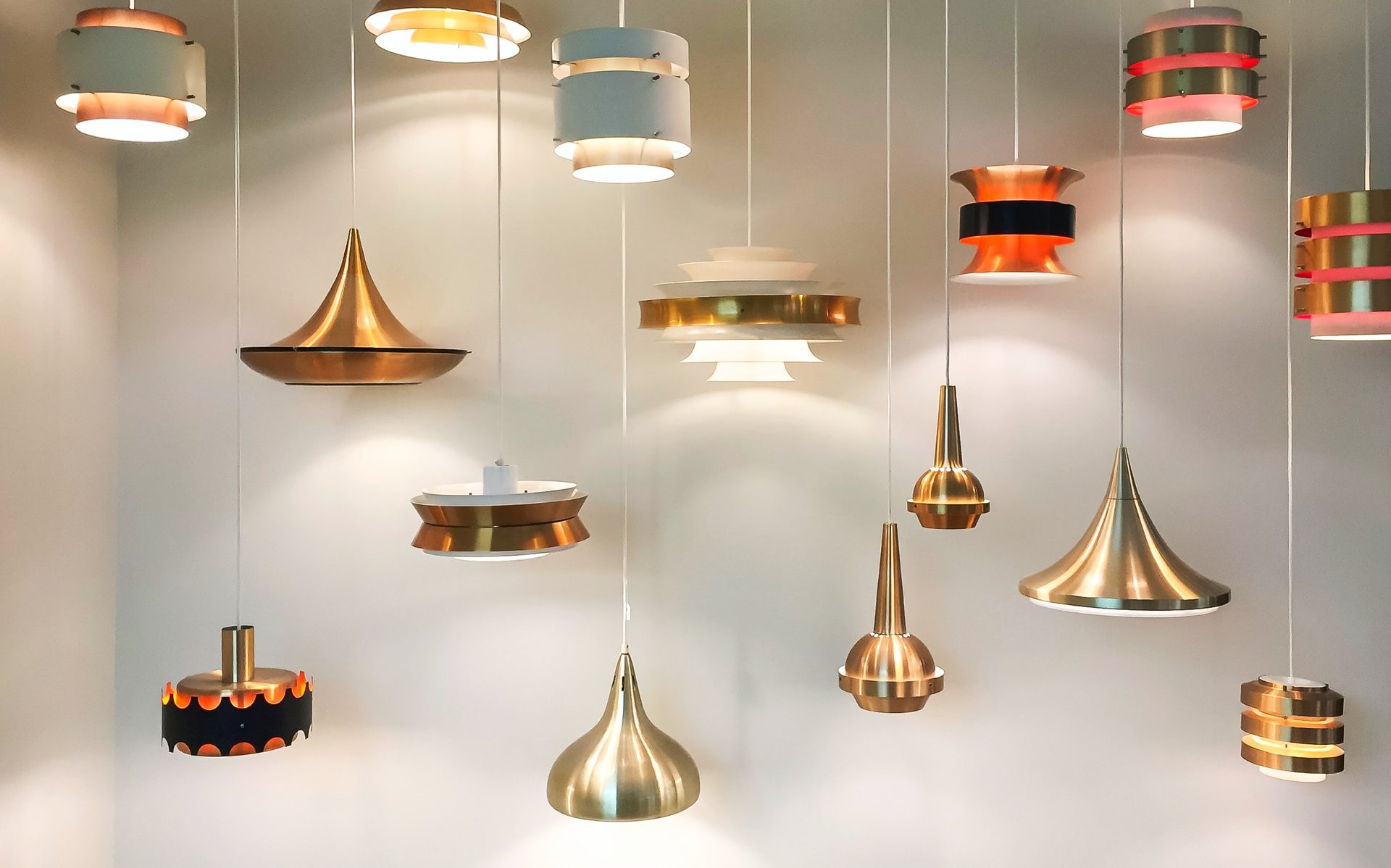 gold and red pendant lamps